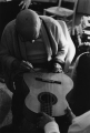 Picasso signing Manitas de Plata`s guitar